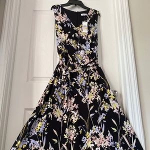 Calvin Klein women’s black floral dress. Size: S/CH/P